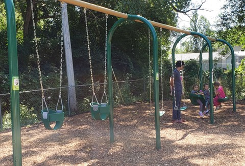Swingset with seats for children and toddlers